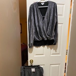 Two piece shimmery silver skirt  suit